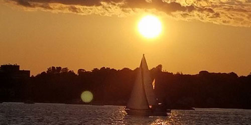 Sunset & Sailboat 500x250 - Black Hawk Party Boat - Niantic, CT